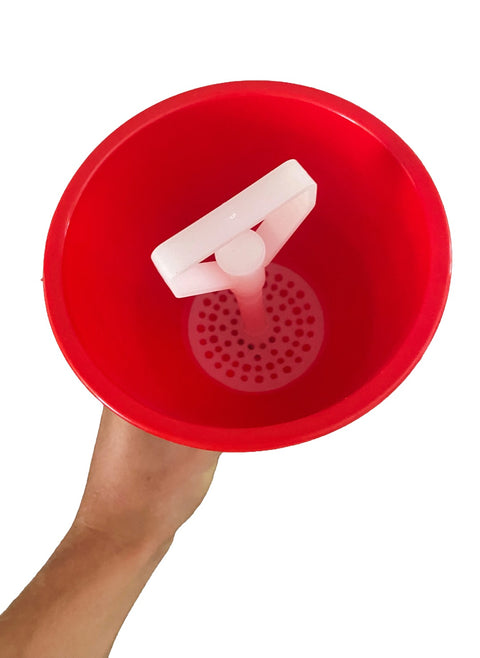 Trakt til saftflasker med stoppefunksjon